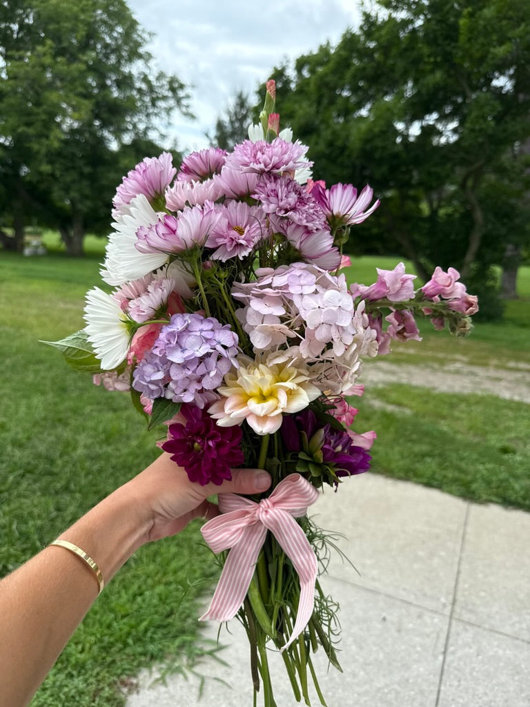 Hand-tied seasonal bouquet with pink gingham ribbon from Madison's Meadow